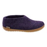 Purple slipper with a brown sole on a white background