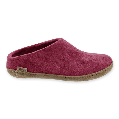 Cranberry slipper with leather sole on a white background