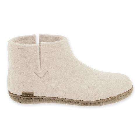 White wool boot with leather sole.