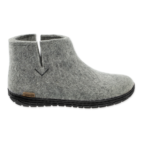 Grey wool boot with a black rubber sole.