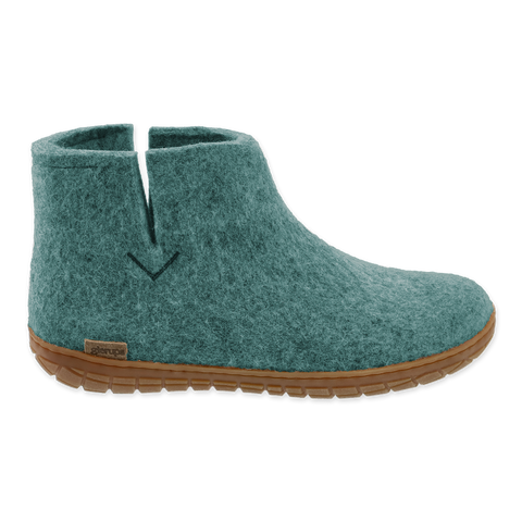 North Sea wool boot with a natural rubber sole on a white background.