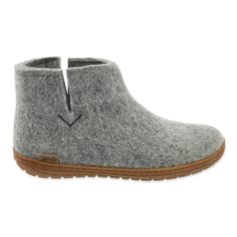 Grey wool boot with a natural rubber sole.