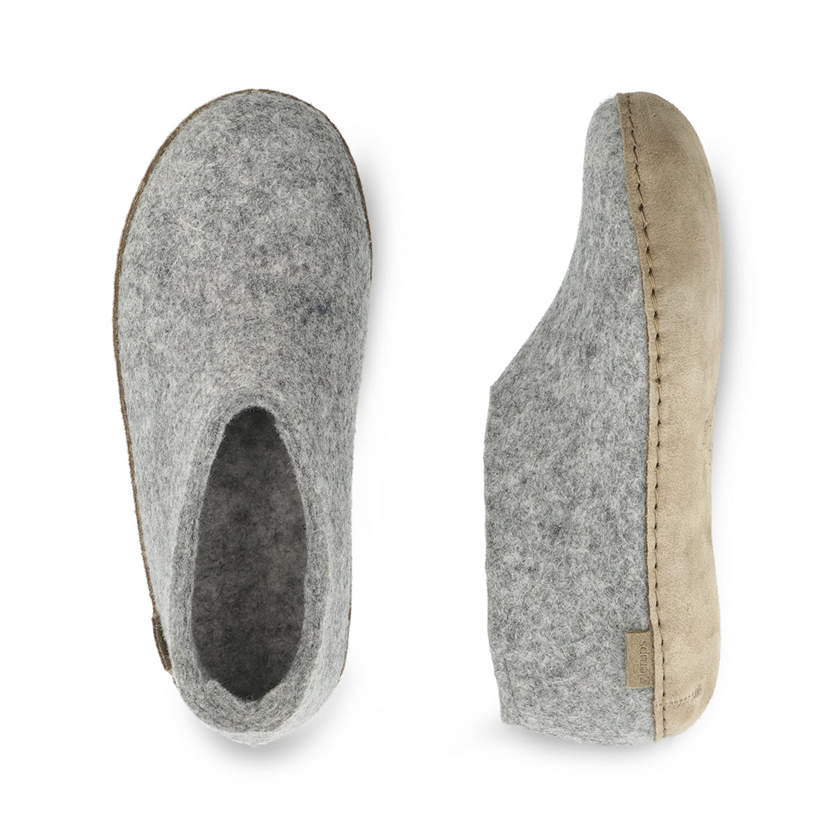 Pair of gray slippers with a beige sole on a white background