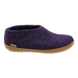 Purple slipper with a brown sole on a white background