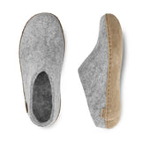 Gray slippers with a leather sole on a white background