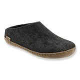 Dark gray slipper with brown sole on a white background
