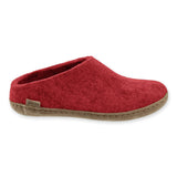 Red slipper with leather soles on a white background
