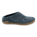 Denim slipper with leather sole on a white background