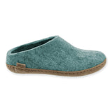 Teal slipper with leather sole on a white background