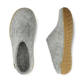 Gray slippers with brown soles on a white background