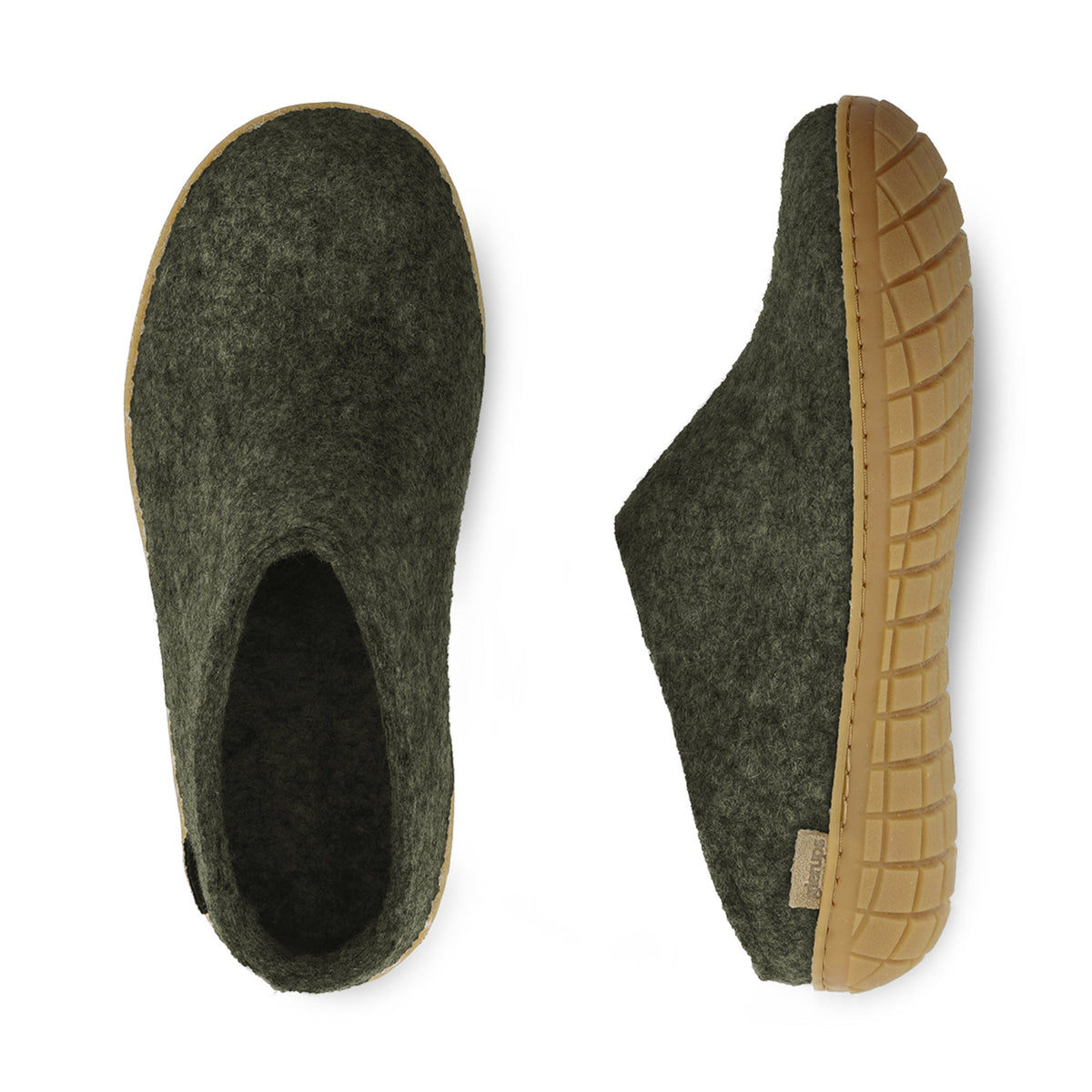Pair of green slippers with rubber soles on a white background
