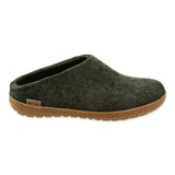 Green slipper with rubber sole on a white background