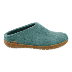Teal slipper with a natural rubber sole on a white background