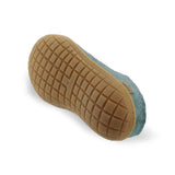 Textured brown rubber sole on a white background