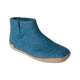 Blue felt ankle boot on a white background