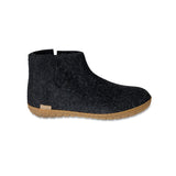 Dark gray ankle boot with honey rubber sole on a white background