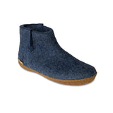 Blue felt ankle boot with honey rubber sole on a white background