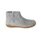 Gray ankle boot with honey rubber sole on a white background