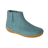 Teal ankle boot with brown honey rubber  on a white background