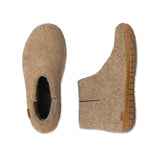 Pair of brown slippers on a white background