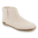Beige slip-on shoe on a white background