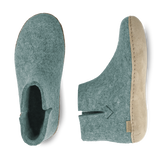 Top and side view of a North sea boot with a leather sole.