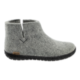 Grey wool boot with a black rubber sole.