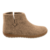Sand wool boot with a natural rubber sole.