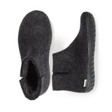 Pair of dark gray ankle boots on a white background