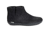 Dark gray ankle boot on a white background