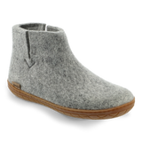 Grey wool boot with a natural rubber sole.