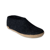 Black felt slipper with a brown sole on a white background