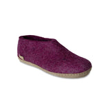 Cranberry felt shoe on a white background