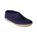 Purple slipper with beige sole on a white background