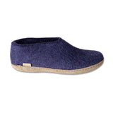 Purple slipper on a white background