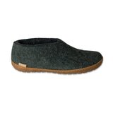 Forest green slip-on shoe with honey rubber sole on a white background