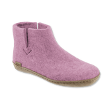 Pink ankle boot on a white background