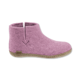 Pink felted boot on a white background